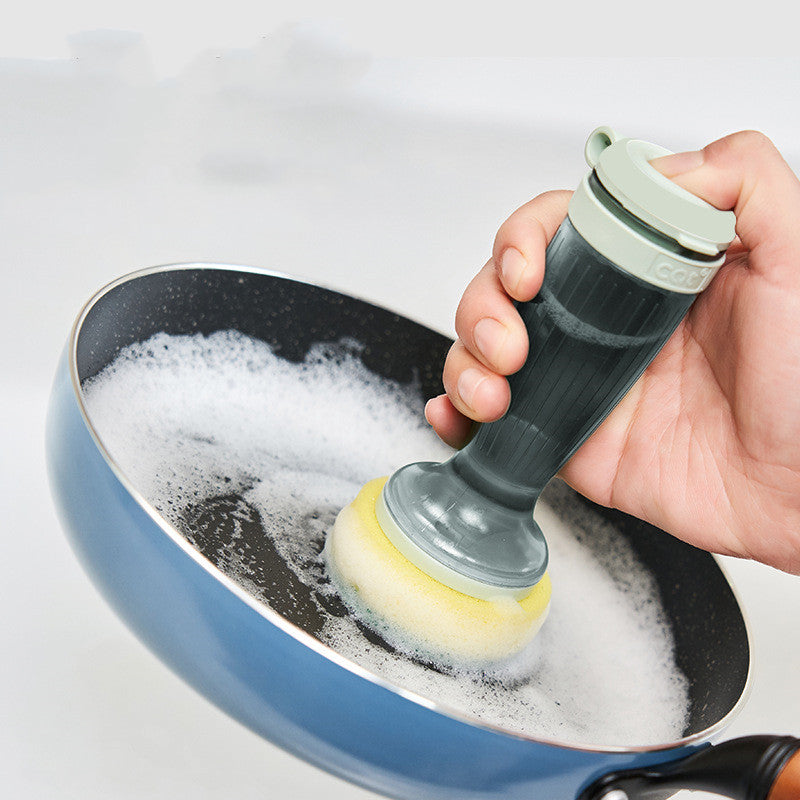 Brush with soap dispenser